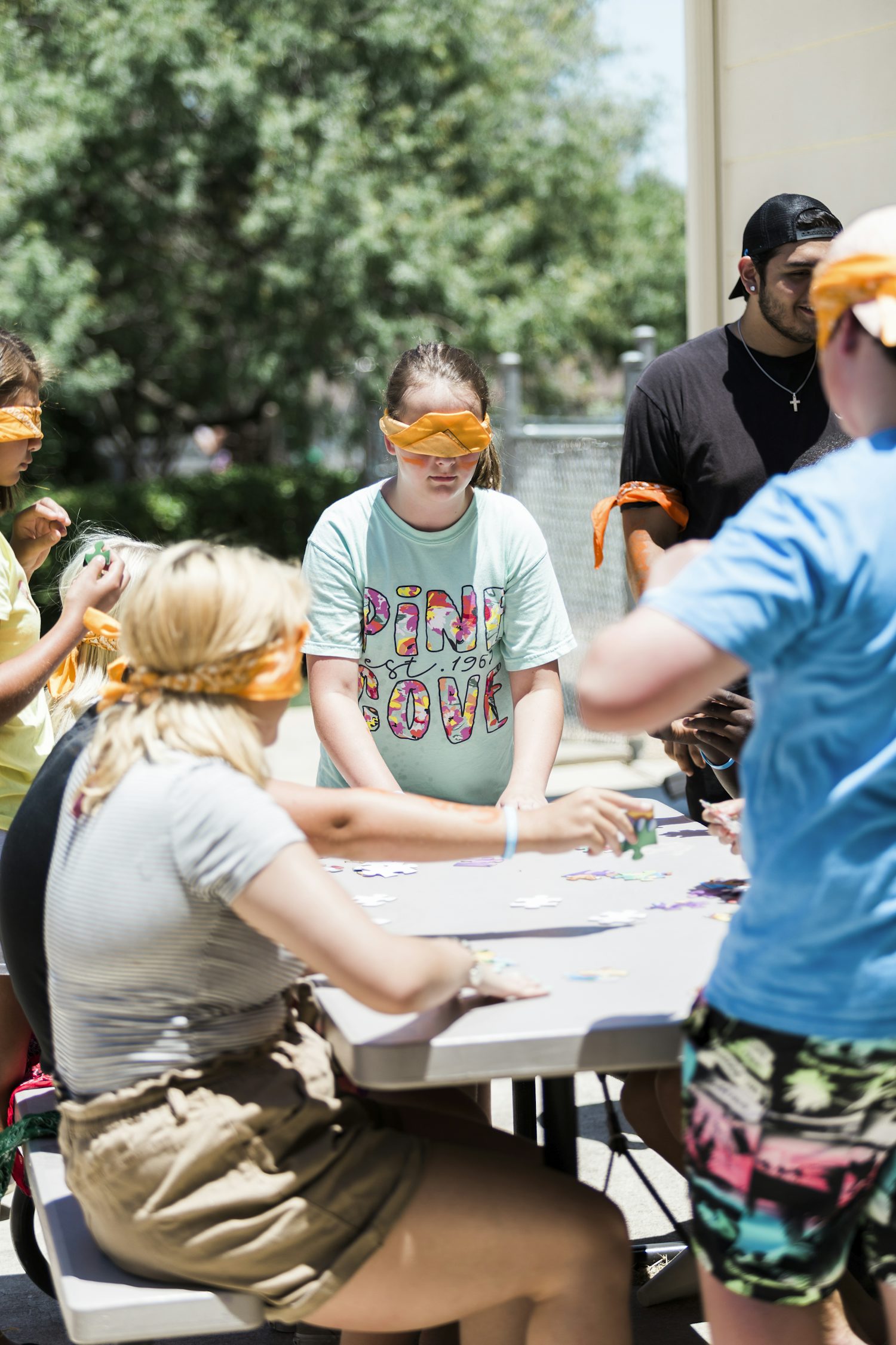 A group of young people taking part in an activity together at a youth centre